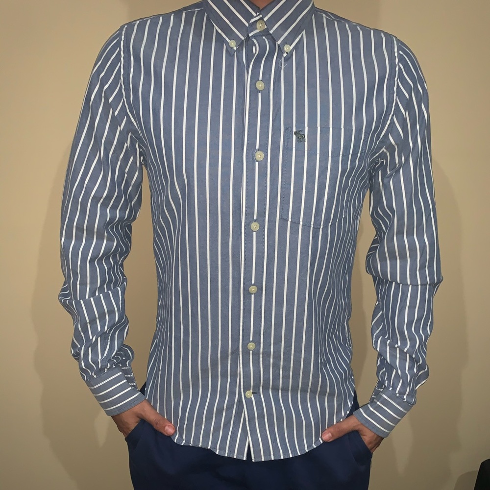 Muscle dress shirt, models height is 5’8
